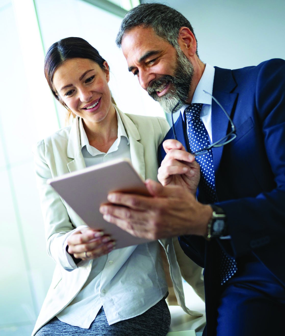A My Advisor client and advisor reviewing a plan together on a tablet